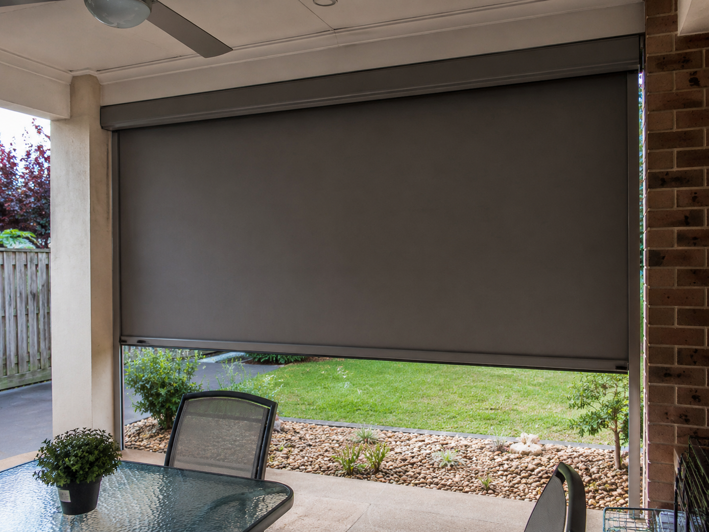 Custom outdoor motorised roller blind installation project in Oakleigh